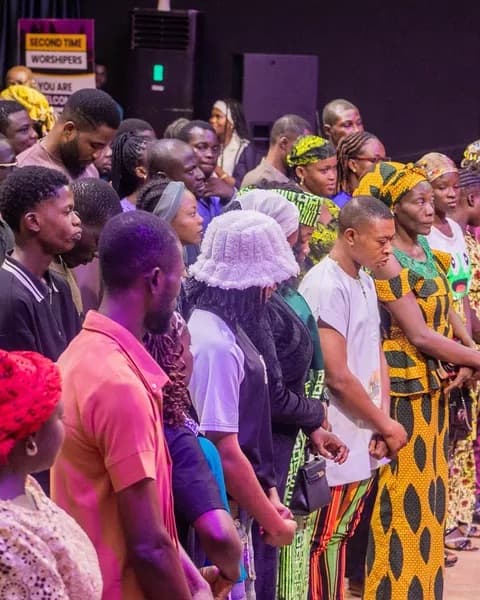 Image of guest being welcomed to the church on a sunday service.